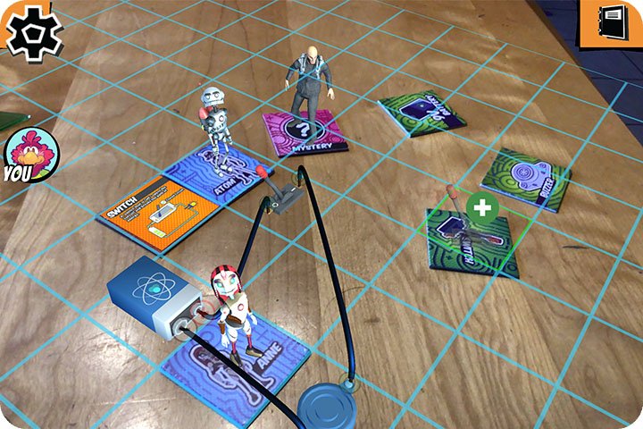 AR circuits and characters via a screenshot of a student desk.