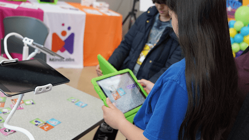 Students working on an iPad